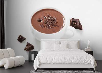 Hot chocolate drinks and chocolate pieces in white cup. Wall mural