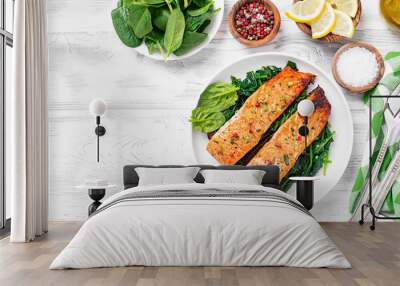 Salmon fillet with spinach . Wall mural