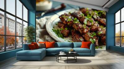 Grilled beef kebabs garnished with herbs on a white plate Wall mural