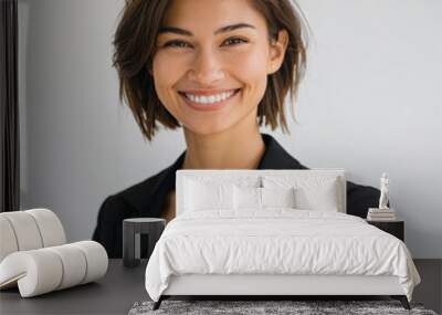 a beautiful and slim 25 years old brunette professional real estate smiling in a size plan, in a whi Wall mural