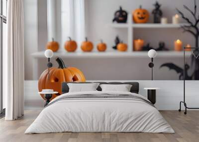 An orange jack-o'-lantern pumpkin with a carved face on a white table , with shelves in the background displaying various Halloween decorations including more pumpkins , bats , and other spooky items Wall mural