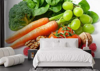 image of fresh fruits and vegetables, white background, three bright orange carrots, two types of tomatoes, green grapes, raspberries, and walnuts. The green leaves Wall mural