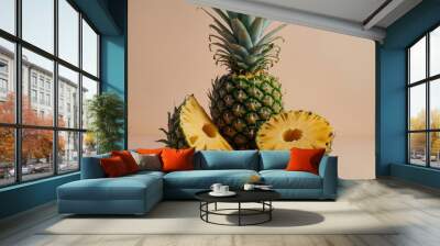 A pineapple is cut in half and has a small piece missing Wall mural