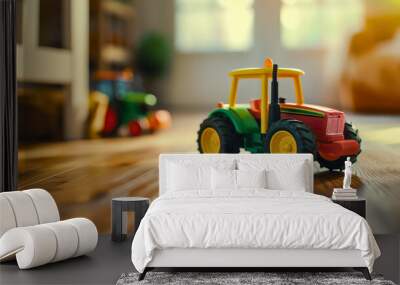 Closeup of small plastic green and yellow tractor toy on the carpet on the floor in room interior. Agriculture farming vehicle machine model for children play Wall mural