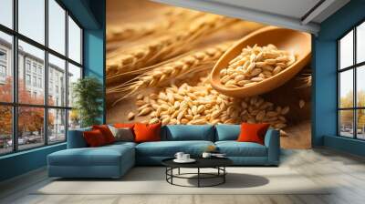 Organic nutritious uncooked barley wheat whole grain cereal seed in a wooden spoon close up wooden table kitchen photography, crops after the harvesting, branch stem and ripe, countryside agriculture Wall mural