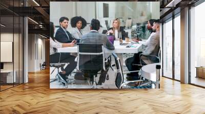 Business people discussing together in conference room during meeting at office in a modern startup. Wall mural