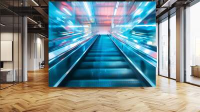 Motion blur effect on an escalator with bright blue lighting Wall mural