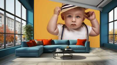 Adorable little baby boy posing. Wall mural