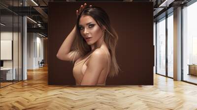 Beauty portrait of sensual brunette girl. Wall mural