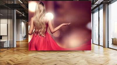 Blonde lady in red elegant maxi dress. Wall mural