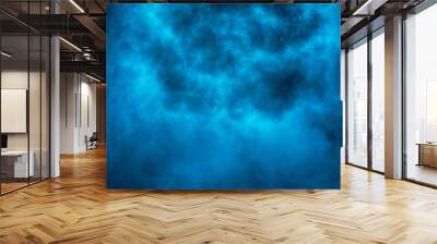 Explosion of blue powder. Wall mural