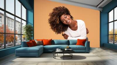 Happy african american woman smiling. Wall mural