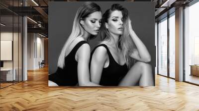 Two attractive twins women in glamour makeup Wall mural