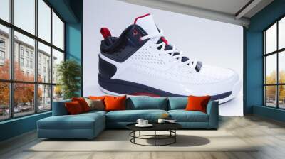 Men's sneakers. White background. Side view. Unbranded shoe model. Wall mural