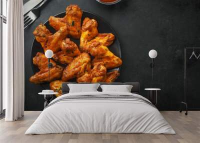 Chicken wings grilled in sauce on plate Wall mural