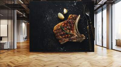 Grilled steak with spices on dark Wall mural