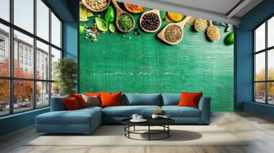 Spices and herbs on wooden background Wall mural