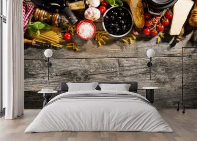 Tasty fresh appetizing italian food ingredients on old rustic wooden background. Ready to cook. Home Italian Healthy Food Cooking Concept. Toning. Wall mural