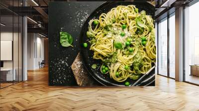 Tasty pasta with pesto served on plate Wall mural