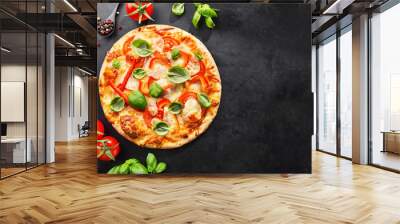 Tasty vegetarian pizza on dark background Wall mural