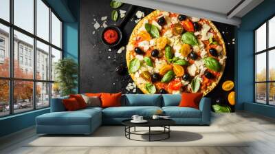 Traditional italian pizza on dark table Wall mural