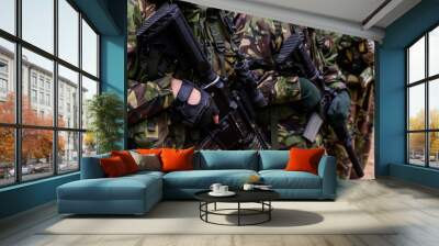 Soldier carrying his rifle in combat trainin Wall mural