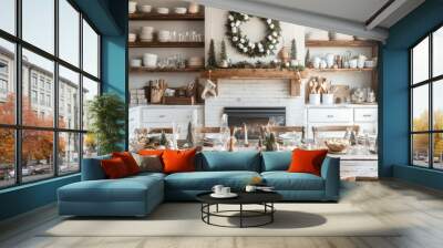 A cozy farmhouse kitchen adorned for Christmas, featuring open shelves, a festive table setting, and a wreath of cotton stems above the fireplace Wall mural