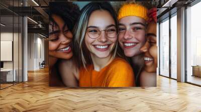 A diverse group of four friends joyfully celebrating body positivity with smiles and hugs, embracing their unique beauty in a warm indoor setting Wall mural