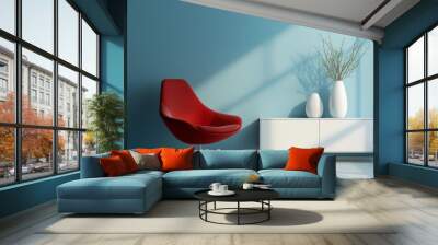 A vibrant red chair paired with a white vase on a sleek sideboard enhances the modern aesthetic of a stylish living room against a soft blue wall in natural light Wall mural