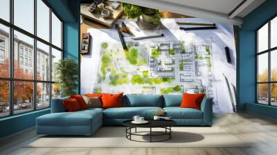 Architectural plans with landscape design on the desk. Top view Wall mural