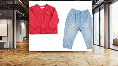 Composition with baby red cardigan, jeans, and toy photo camera on white background Wall mural