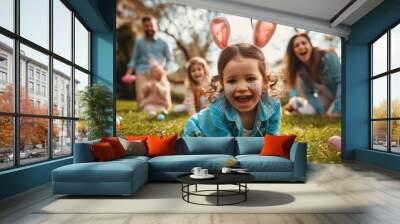 Joyful Child with Bunny Ears hunting easter eggs Outdoors Wall mural