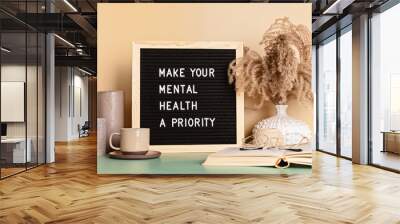 Make your mental health a priority motivational quote on the letter board. Inspiration psycological text Wall mural