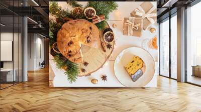 Panettone, traditional italian Christmas sweets for winter holidays celebration. Cristmas desert, festive dinner concept Wall mural