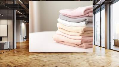 Pile of baby jersey textile in pastel colors Wall mural