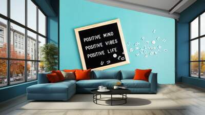 Positive mind, positive vibes, positive life motivational quote on the letter board. Inspiration text Wall mural