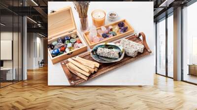 Smudge kit with white sage, palo santo, candles, reiki chrystals. Natural elements for wellbeing, holistic lifestyle idea Wall mural