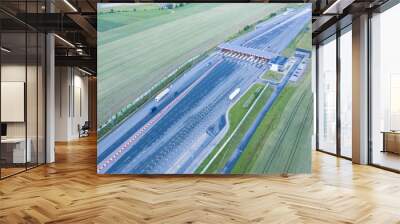 Aerial drone view on toll collection point on the motorway Wall mural