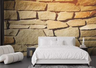 Brick stone wall stack of medieval natural stone texture background or rock strata boundary the rock seamless abstract and fragment of a walls from a gray Wall mural