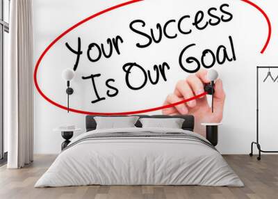 Man Hand writing Your Success Is Our Goal with black marker on visual screen Wall mural