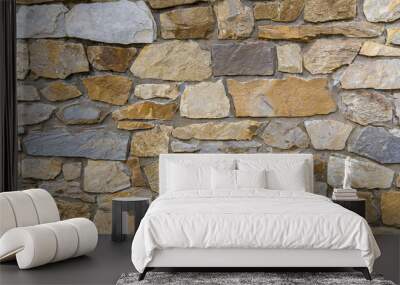 Stone work. Masonry made of old stone. Set of stones of different shapes and colors. Wall mural