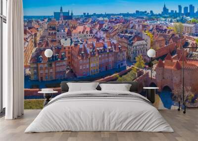 Warsaw, Poland Historic cityscape skyline roof with colorful architecture buildings in old town market square and church tower with blue sky Wall mural