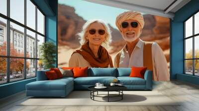 Smiling Elderly Couple Posing in Desert Landscape with Sandstone Formations in Background Wall mural