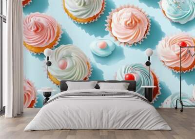 Raster illustration of a sweet themed background design featuring a seamless pattern of cupcakes in pale blue pink and white ideal for cute birthday celebrations Wall mural