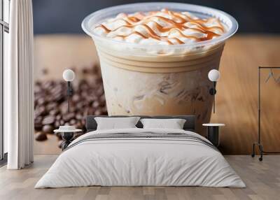 Iced latte with whipped cream and caramel sauce.
Concept: cafe menu for summer drinks Wall mural