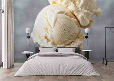 Close up of a vanilla ice cream cone with two scoops against a light gray background. Dessert and summer treat concept. Banner with copy space for ice cream shop advertising and menu. Wall mural