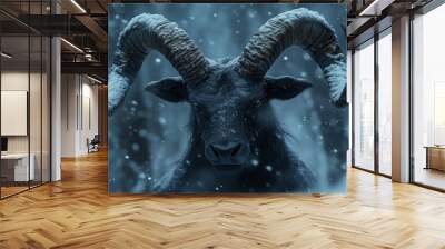 Close up of ram with curved horns in snowfall. Dark winter solstice and wildlife concept. Wall mural