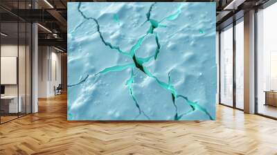 Fractured cold ice surface with glowing cracks for tech-inspired wallpapers Wall mural