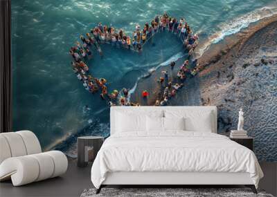 Huge crowd of people forming a heart on the beach Wall mural