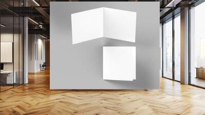 Brochure in square format folded to two - mockup. 3d illustration Wall mural